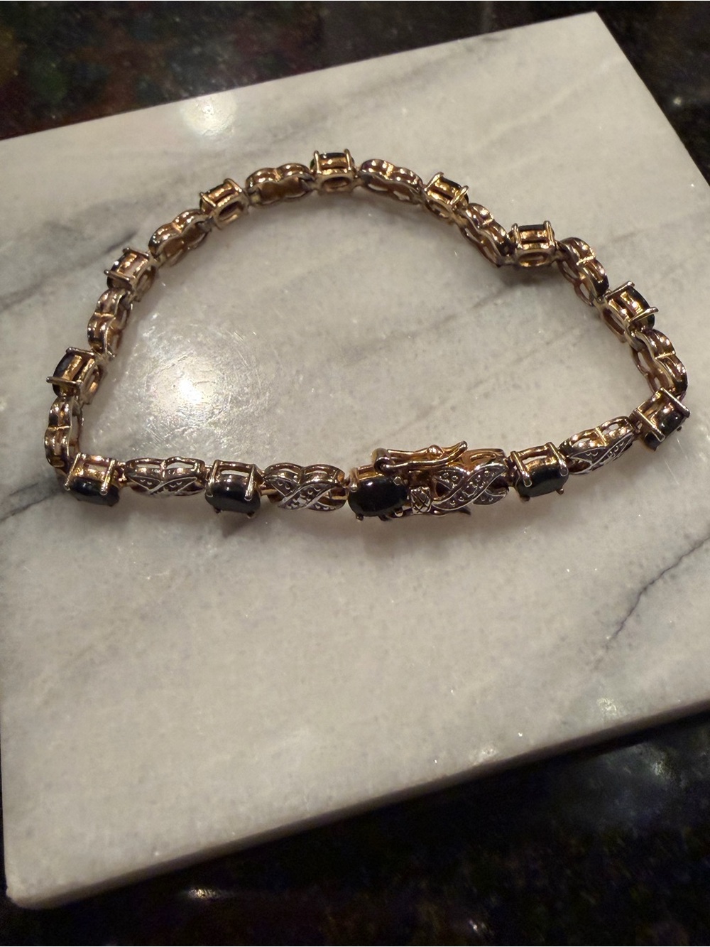 Sterling Silver (gold plated) bracelet with onyx. 7.5 inches long
